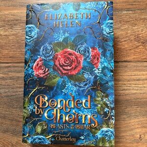Special Edition Book of Bonded by Thorns by Elizabeth Helen (in FRENCH).